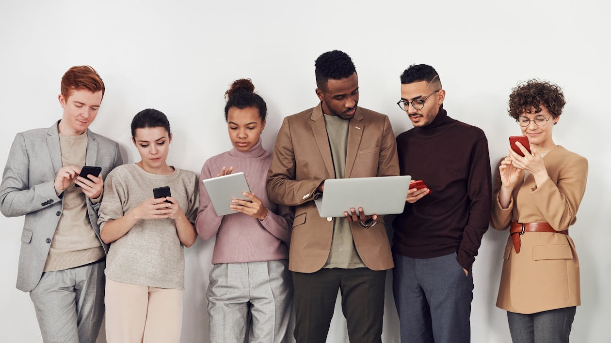 Diverse group of creative professionals collaborating — the community TrustMark serves