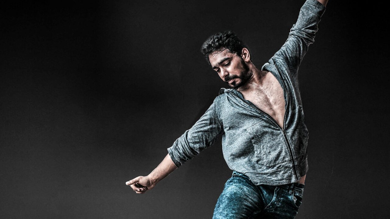 Actor mid-emotional scene with tears and dramatic stage lighting — raw expressive pattern
